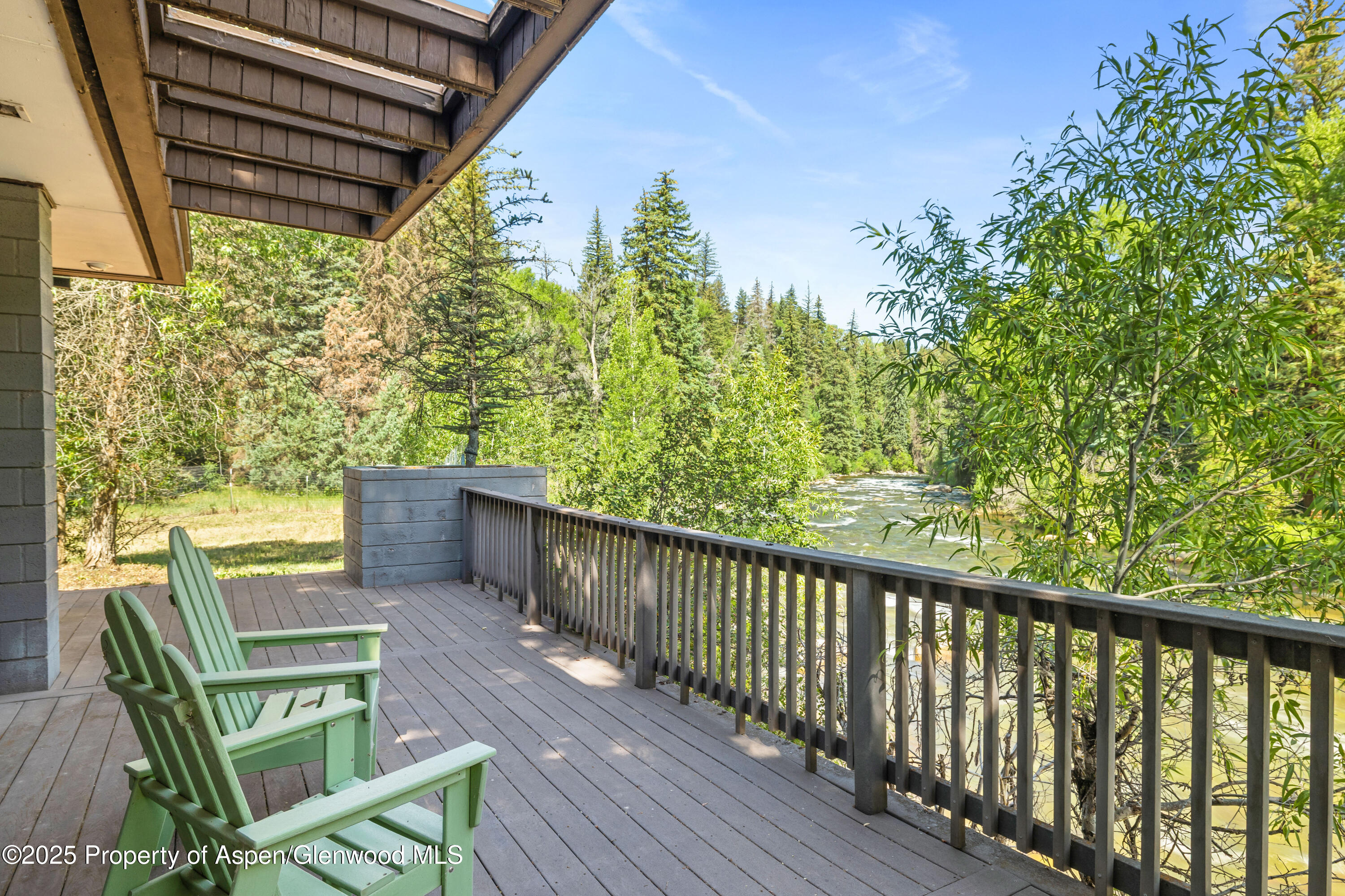 820 Twining Flats Road Aspen, CO 81611 - Photo 9 of 15 a view of a two chairs in the balcony