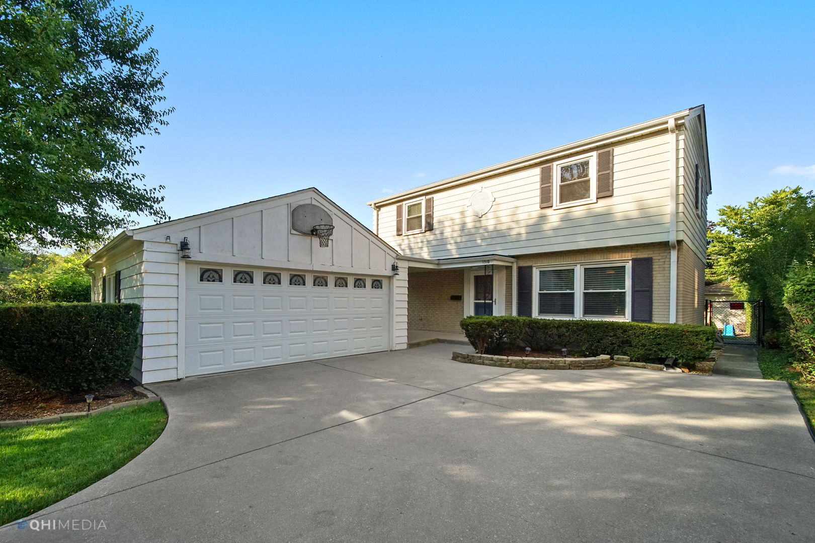 1310 Good Avenue Park Ridge, IL 60068 - Photo 1 of 26 a front view of a house with a yard