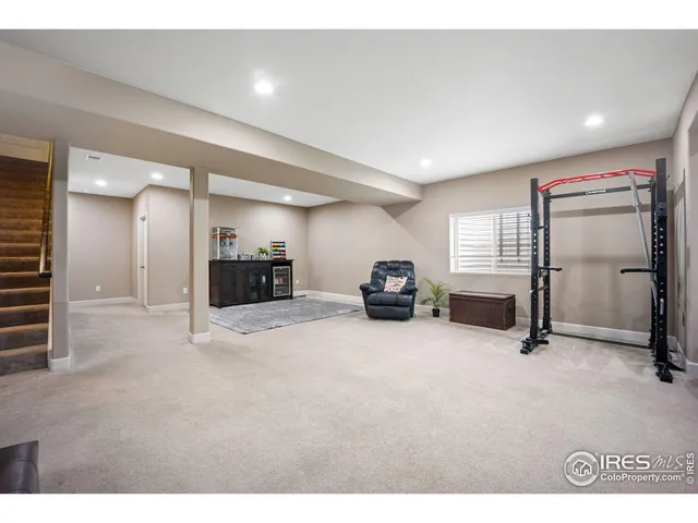 a view of a livingroom with furniture and windows