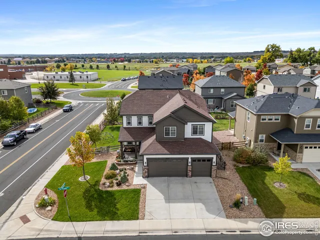 an aerial view of a house with a garden view