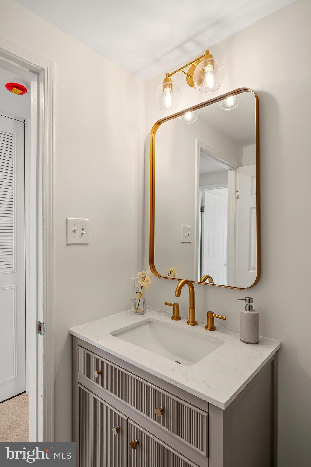 3617 Ripplingbrook Court Bowie, MD 20721 - Photo 12 of 29 a bathroom with a sink vanity and a mirror