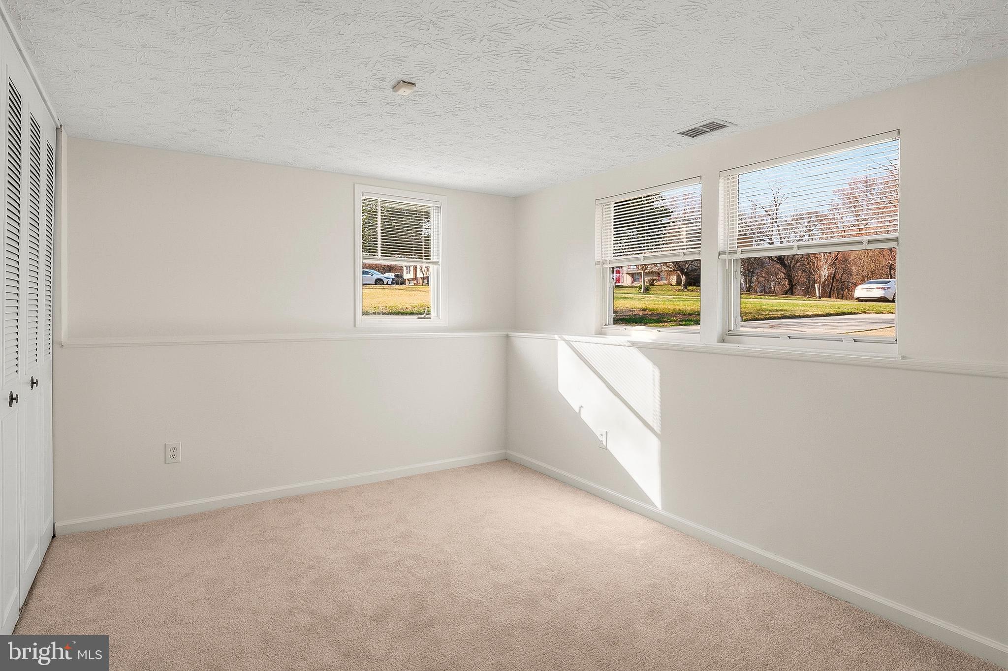 3617 Ripplingbrook Court Bowie, MD 20721 - Photo 17 of 29 an empty room with windows