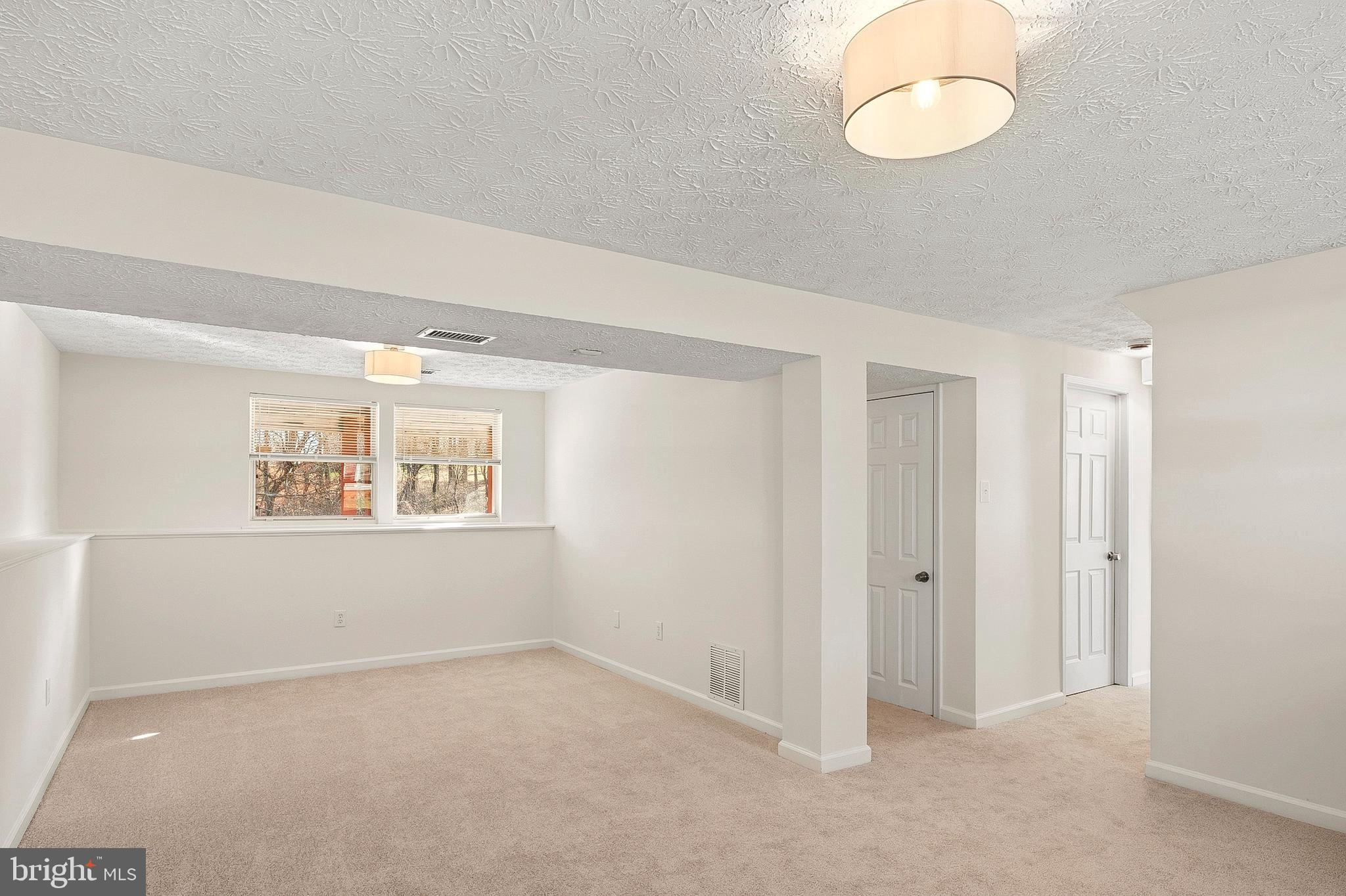 3617 Ripplingbrook Court Bowie, MD 20721 - Photo 18 of 29 a view of an empty room with a window