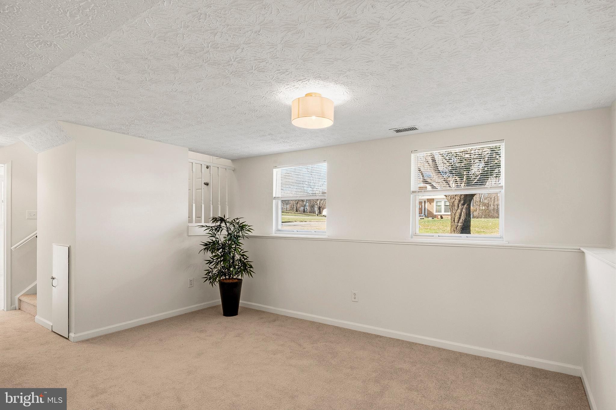 3617 Ripplingbrook Court Bowie, MD 20721 - Photo 20 of 29 an empty room with windows and closet
