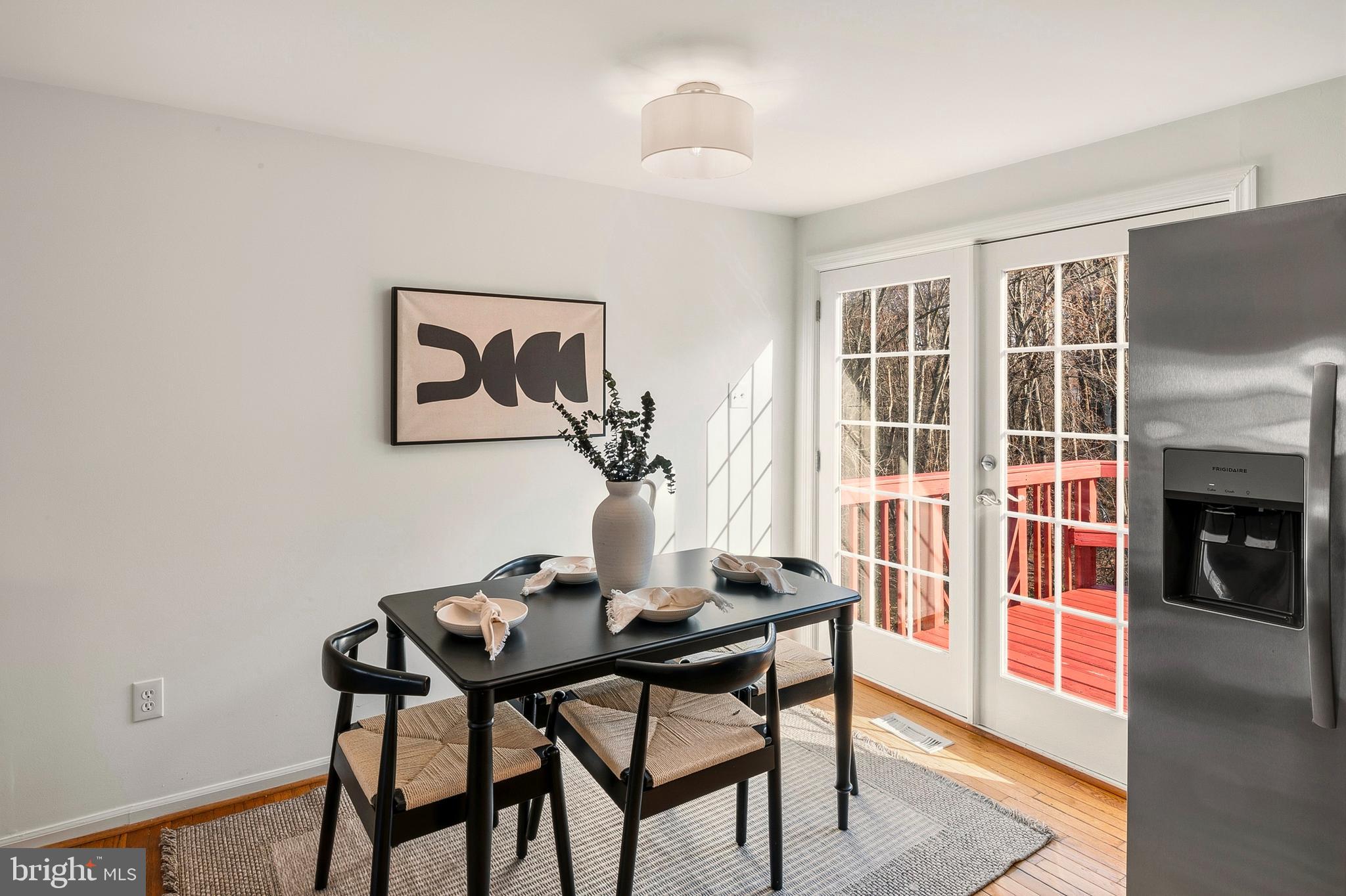 3617 Ripplingbrook Court Bowie, MD 20721 - Photo 9 of 29 a view of a dining room with furniture and a window