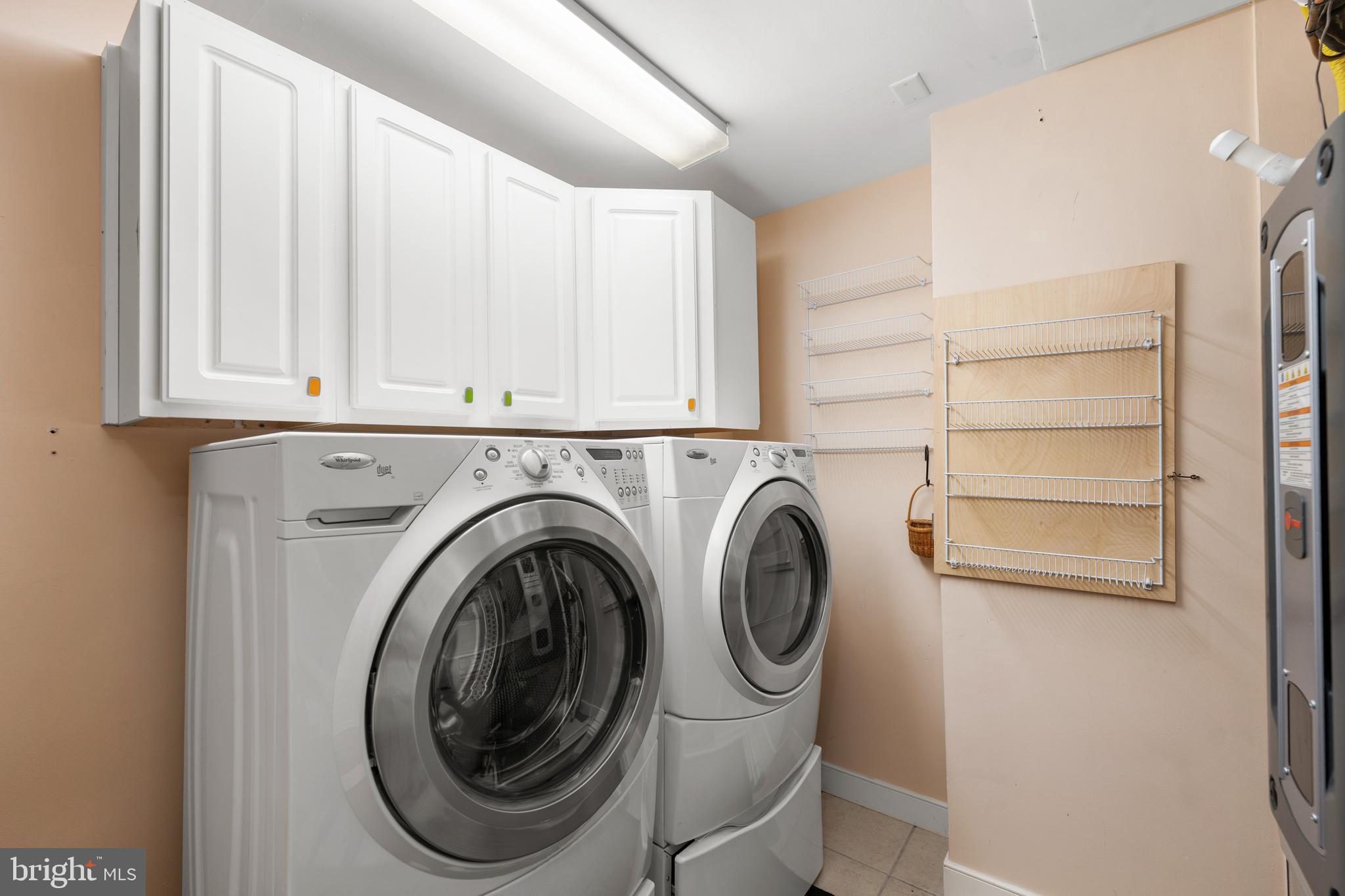 110 Anglers Road, Unit 206 Lewes, DE 19958 - Photo 28 of 40 a utility room with dryer and washer