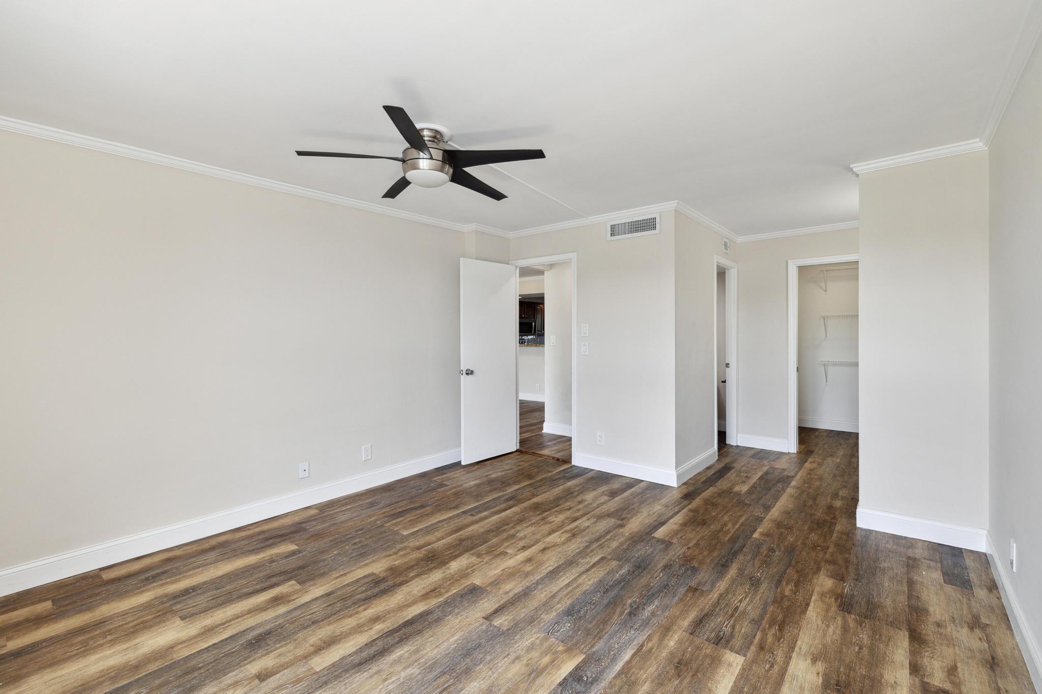 4 Royal Palm Way, Unit 2080 Boca Raton, FL 33432 - Photo 15 of 23 a view of a big room with wooden floor and windows