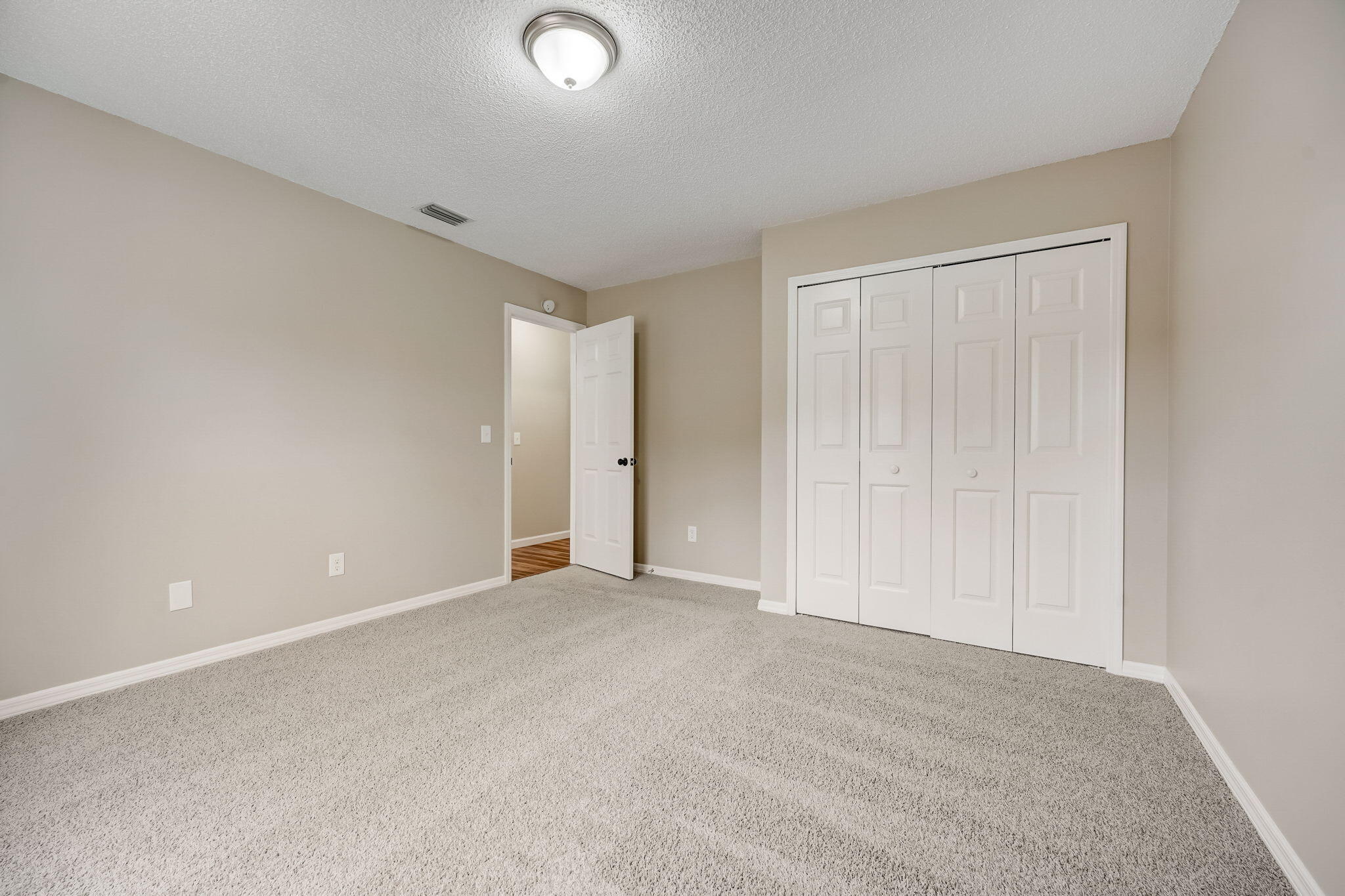 1092 Thompson Road Southwest Palm Bay, FL 32908 - Photo 10 of 17 a view of an empty room