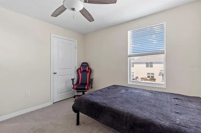 aerial view of a house with a yard