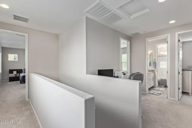 a living room with a couch and a table