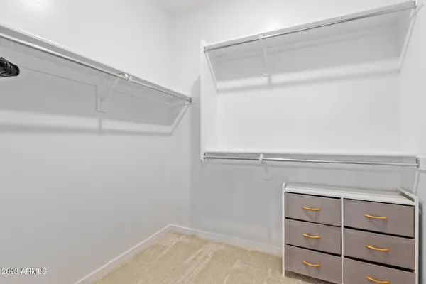 a view of an empty walk in closet