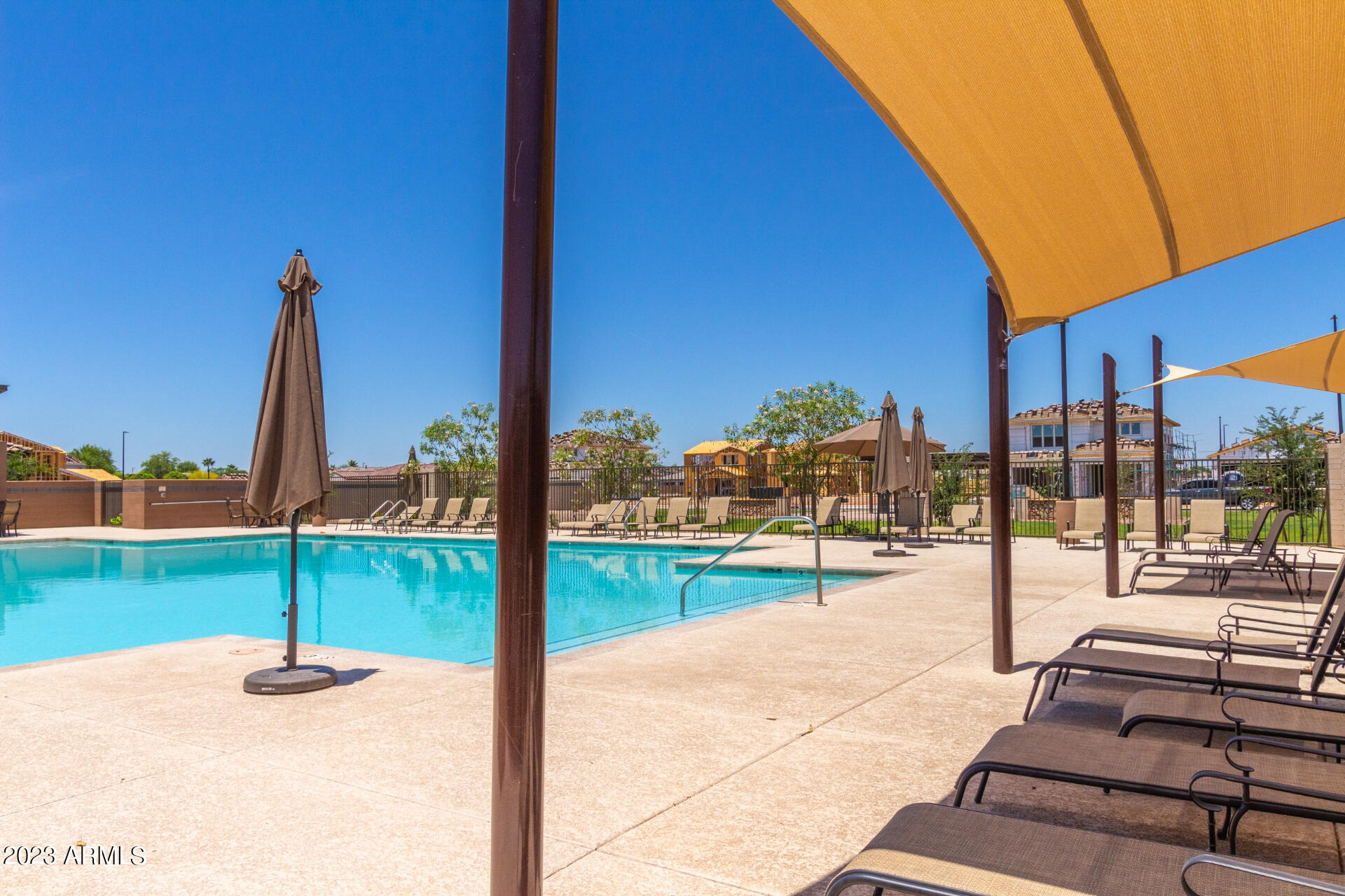 1954 South Follett Way Gilbert, AZ 85295 - Photo 31 of 38 a view of a patio with a table and chairs