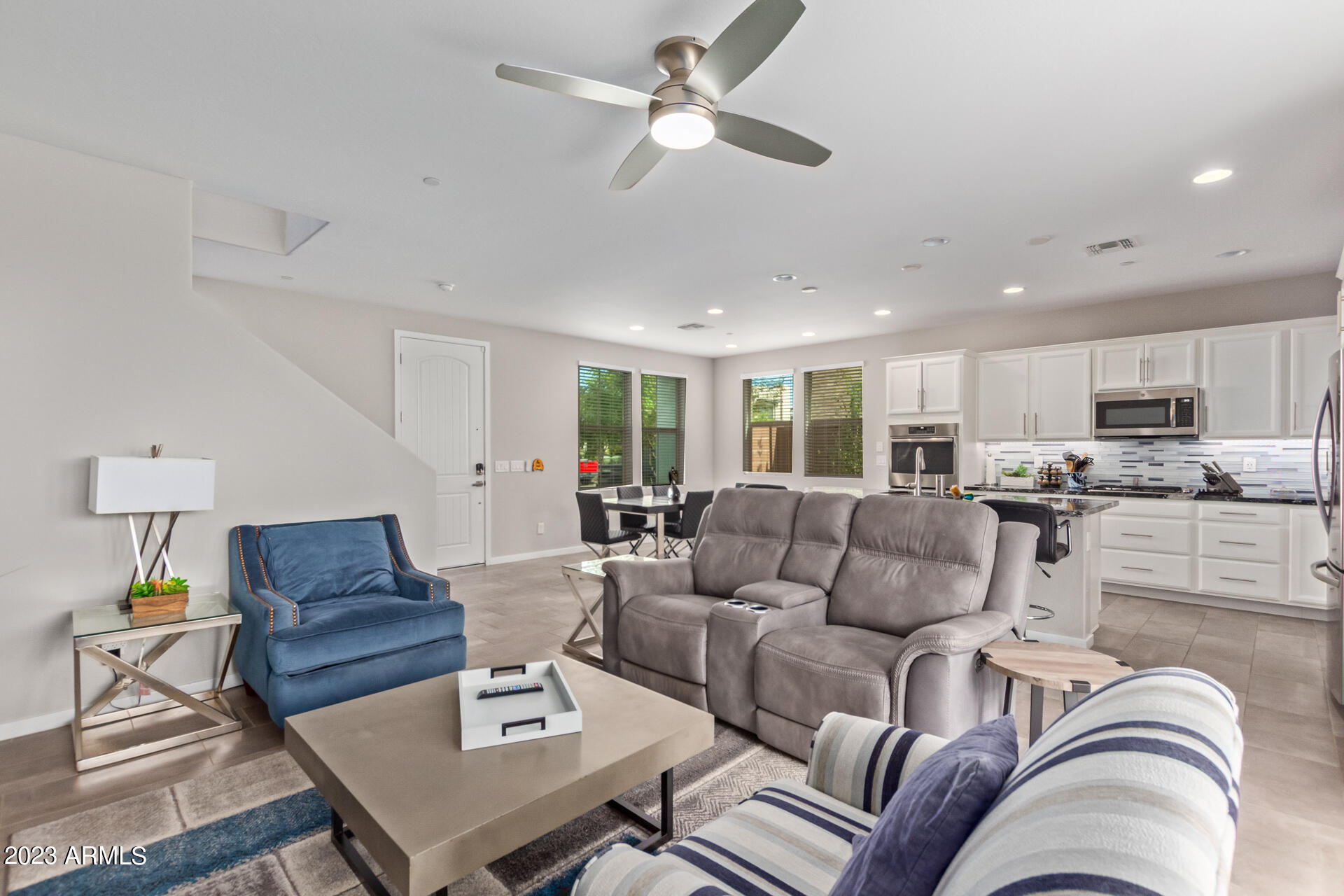 1954 South Follett Way Gilbert, AZ 85295 - Photo 4 of 38 a living room with furniture kitchen view and a chandelier