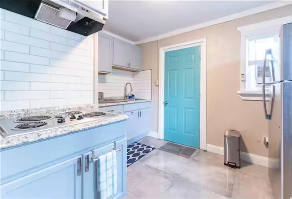 235 Walnut Street Northwest, Unit G Atlanta, GA 30314 - Photo 6 of 10 a kitchen with a sink and a stove top oven