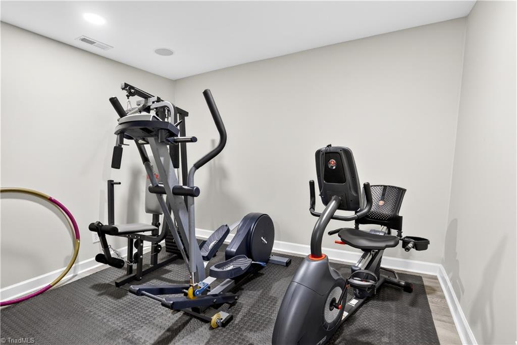 8508 Rosedale Drive Oak Ridge, NC 27310 - Photo 35 of 50 Skip the membership—your gym is downstairs.