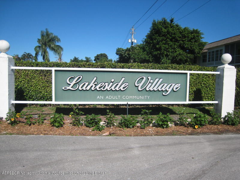 502 Davis Road, Unit 3 Palm Springs, FL 33461 - Photo 2 of 4 lakeside village sign