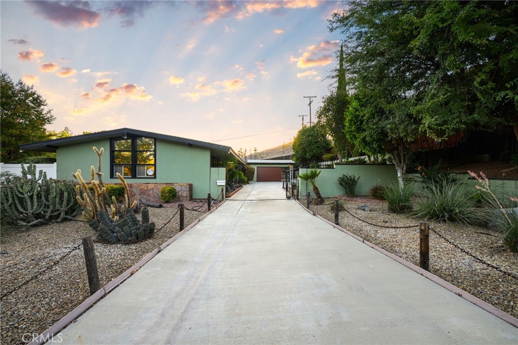 5649 Durango Road Riverside, CA 92506 - Photo 1 of 1 a front view of a house with garden