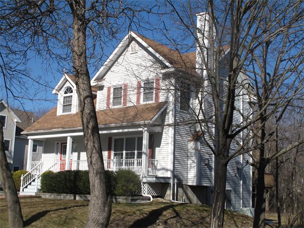 113 Acton Street Maynard, MA 01754 - Photo 19 of 20 a front view of a house with garden