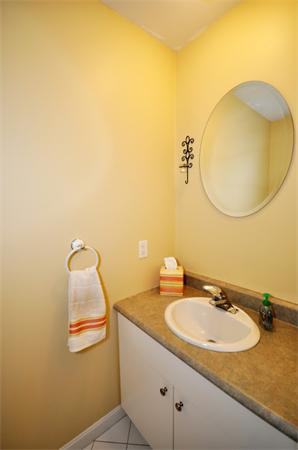 113 Acton Street Maynard, MA 01754 - Photo 9 of 20 a bathroom with a sink and mirror