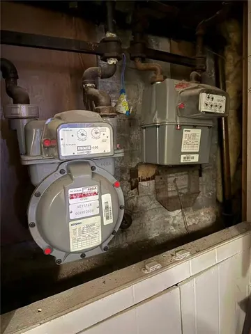 a bathroom with a stove and cabinets