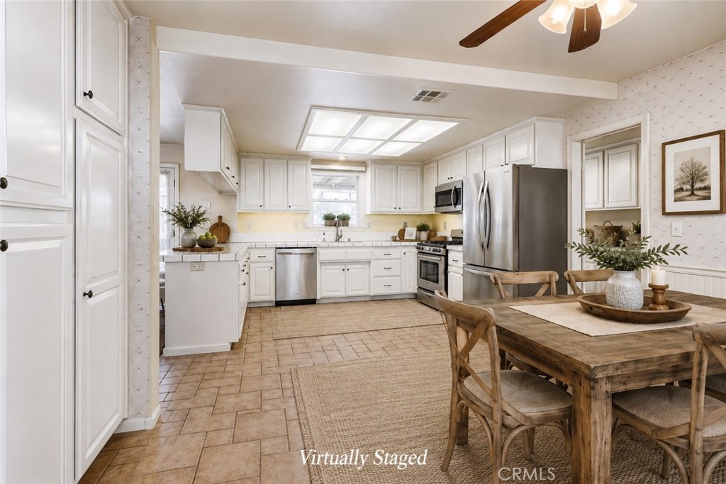 8650 Cowberry Road Phelan, CA 92371 - Photo 22 of 66 Virtually Staged Kitchen & Dining Area