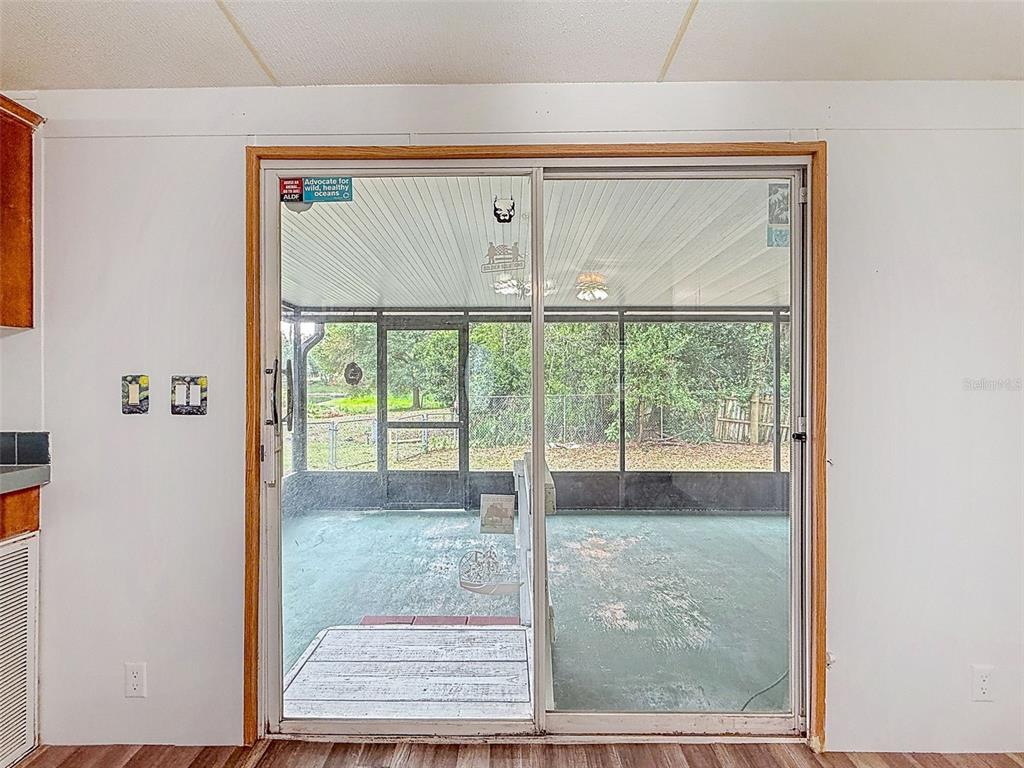 1819 Sinclair Hills Road Lutz, FL 33549 - Photo 25 of 60 a view of an empty room with glass door