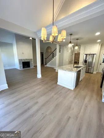 a white toilet sitting next to a window