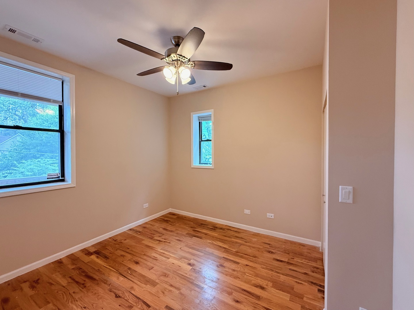 1534 East Marquette Road Chicago, IL 60637 - Photo 18 of 23 a view of a room with wooden floor and natural light