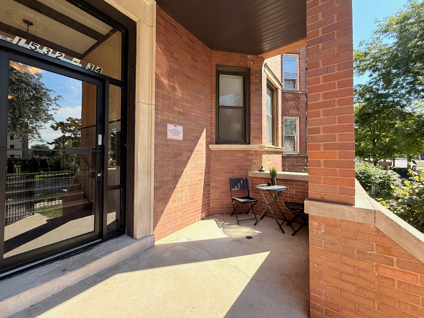 1534 East Marquette Road Chicago, IL 60637 - Photo 3 of 23 a building outdoor space with patio furniture