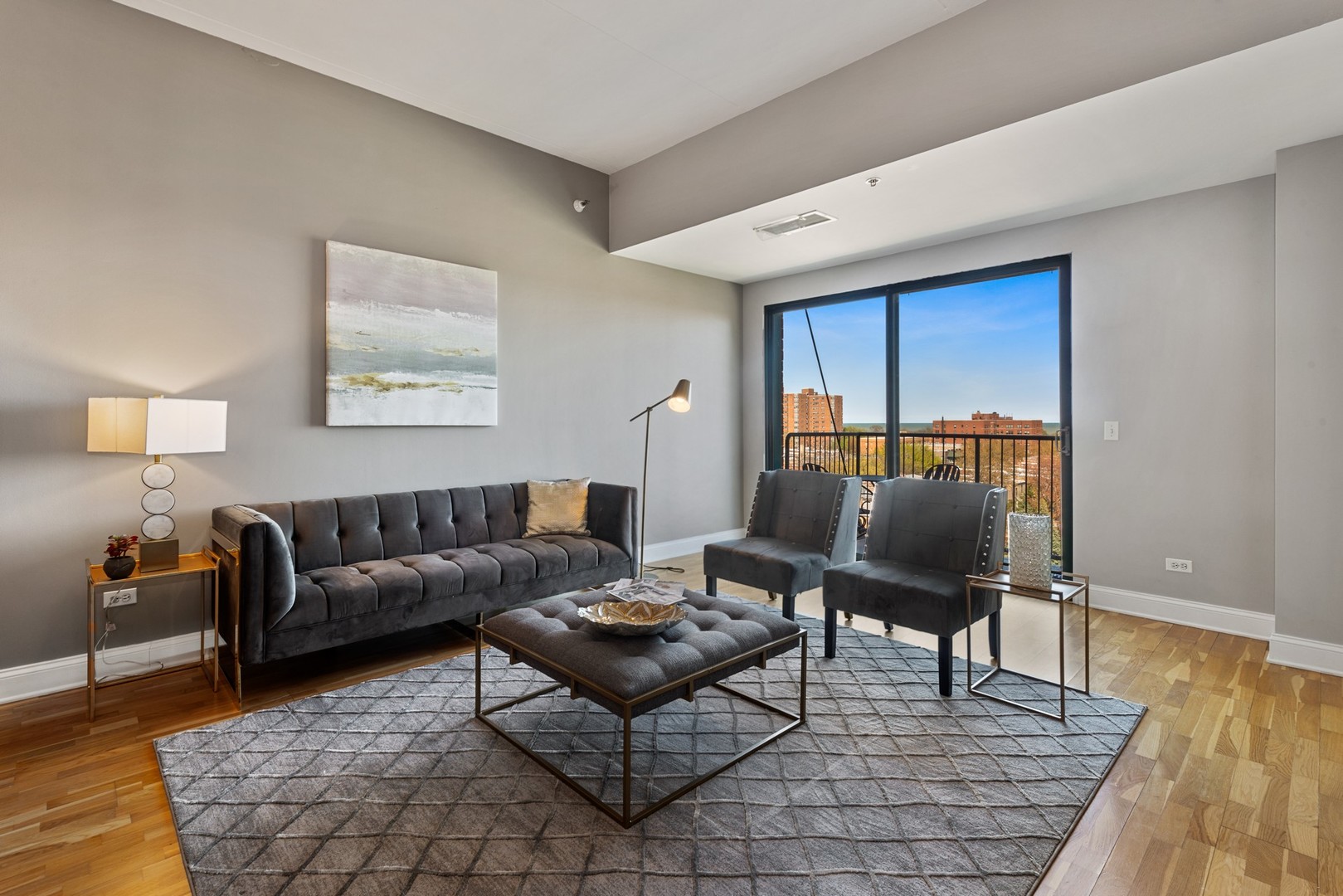 4848 North Sheridan Road, Unit 809 Chicago, IL 60640 - Photo 3 of 45 a living room with furniture and a rug
