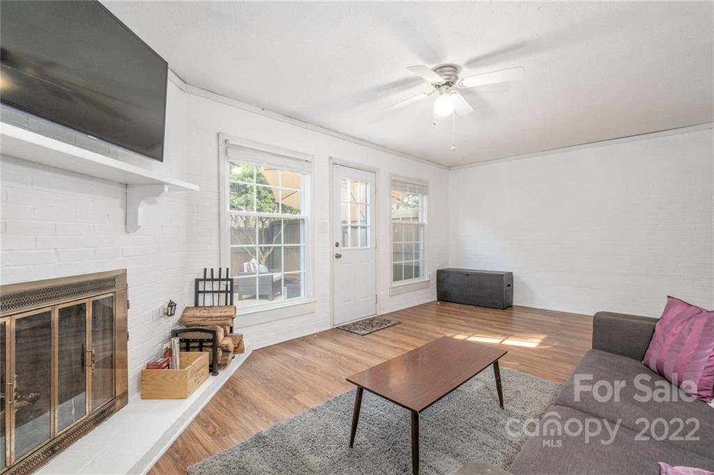 8346 Knights Bridge Road Charlotte, NC 28210 - Photo 19 of 29 a living room with furniture and a window
