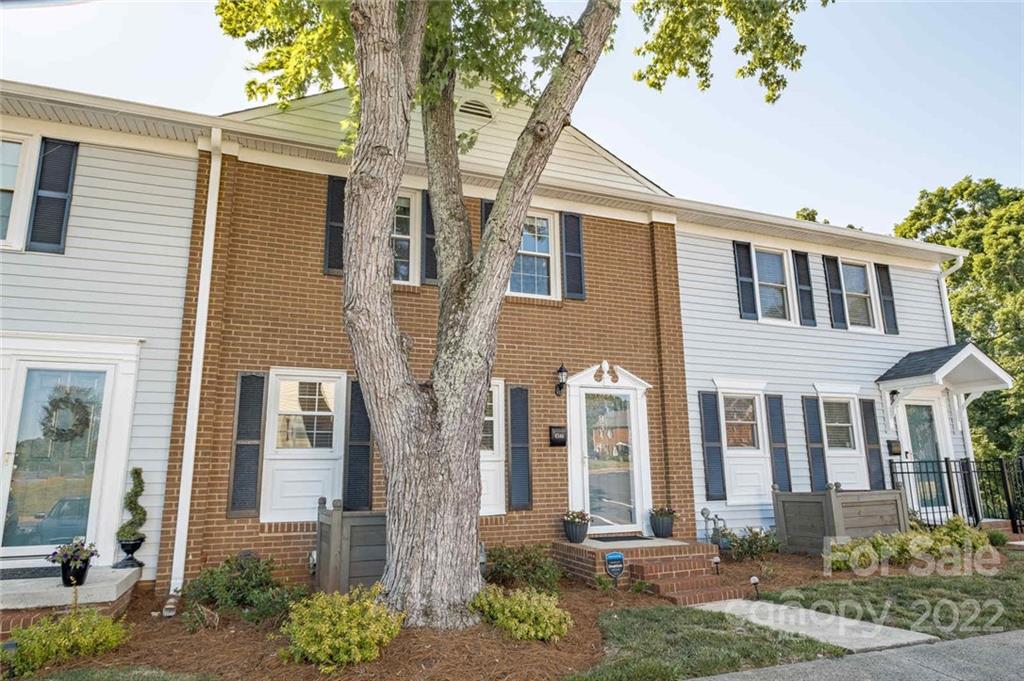 8346 Knights Bridge Road Charlotte, NC 28210 - Photo 2 of 29 a front view of a house with a yard