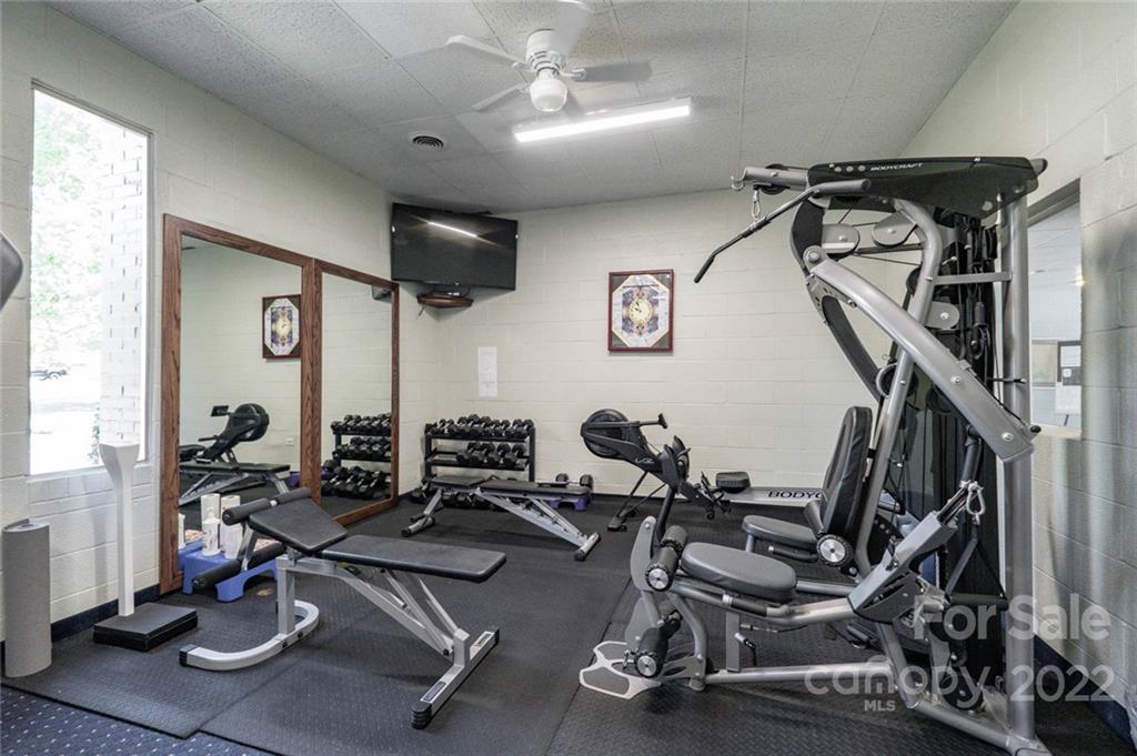 8346 Knights Bridge Road Charlotte, NC 28210 - Photo 28 of 29 a view of a room with gym equipment