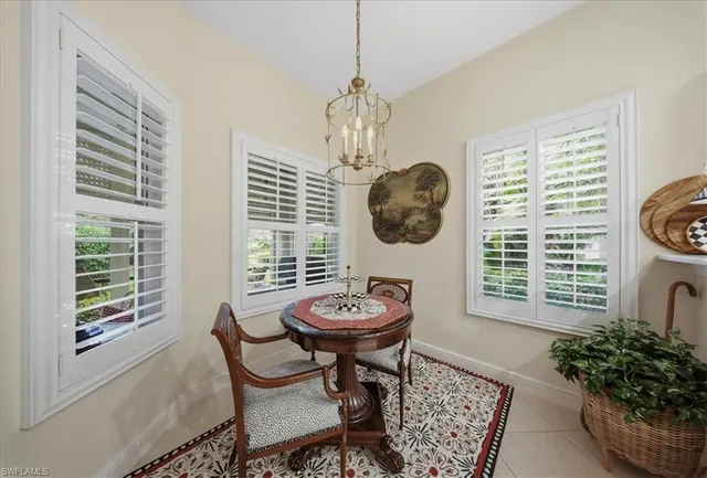 a view of a room with furniture window and wooden floor