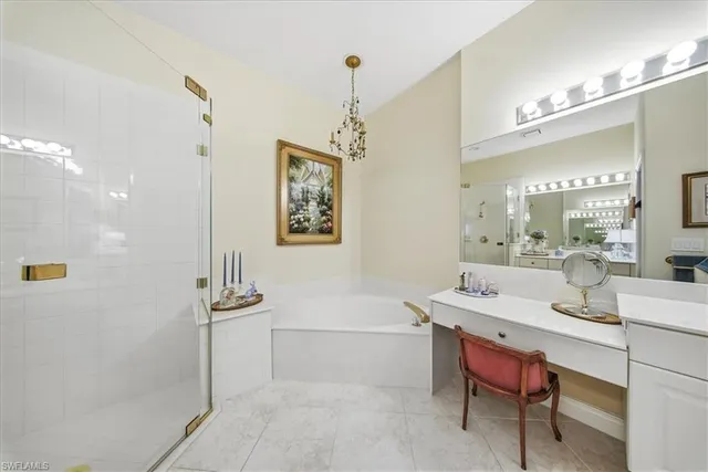 a room with a table chairs and a view of kitchen