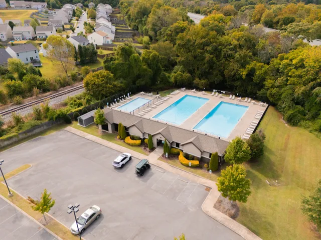 a view of a patio with swimming pool