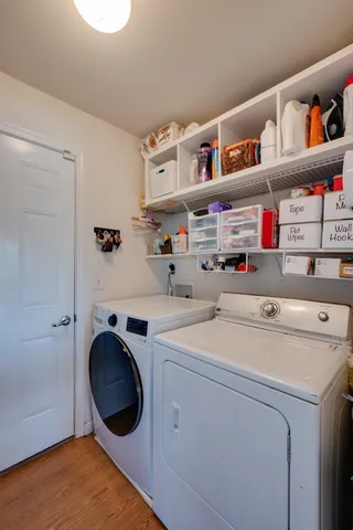 a utility room with dryer and washer