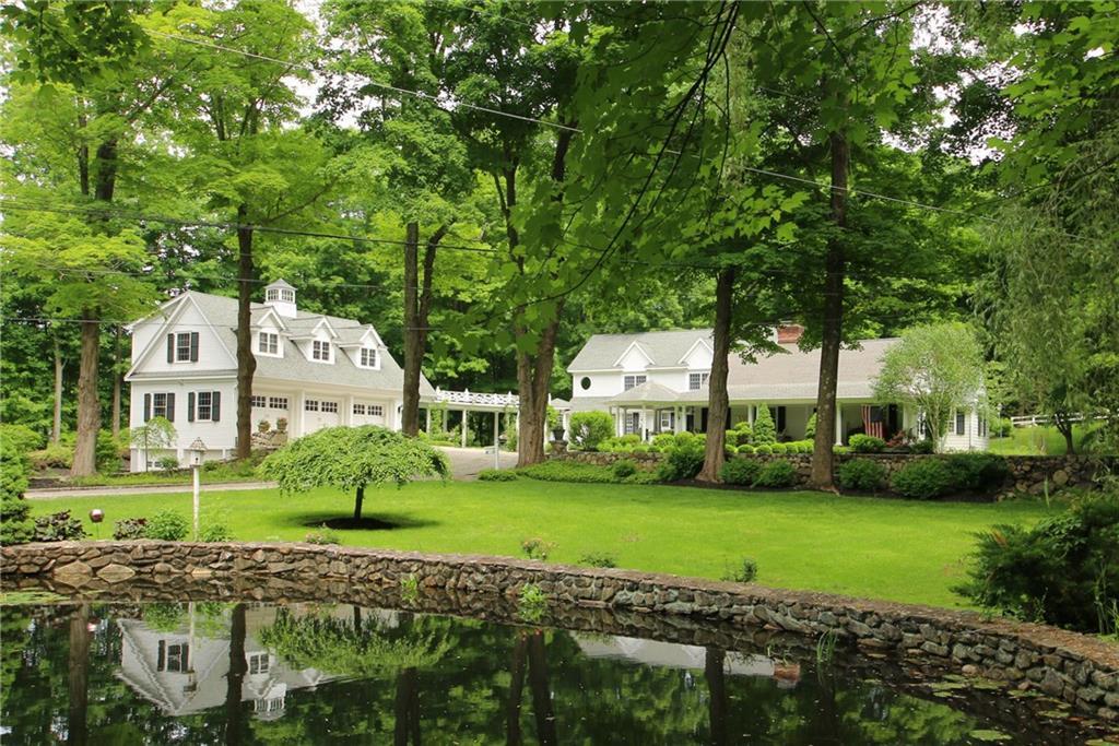488 North Street Ridgefield, CT 06877 - Photo 1 of 1 a front view of a house with garden