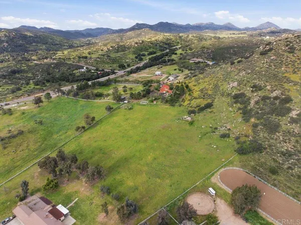a view of a city and mountains ocean view