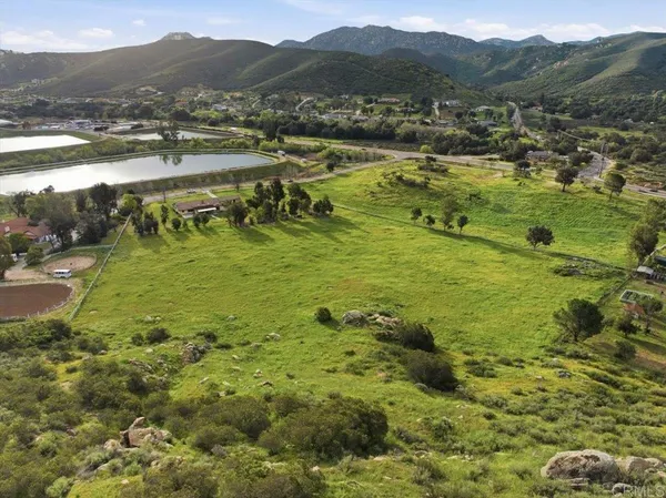 a view of a city with mountains in the background