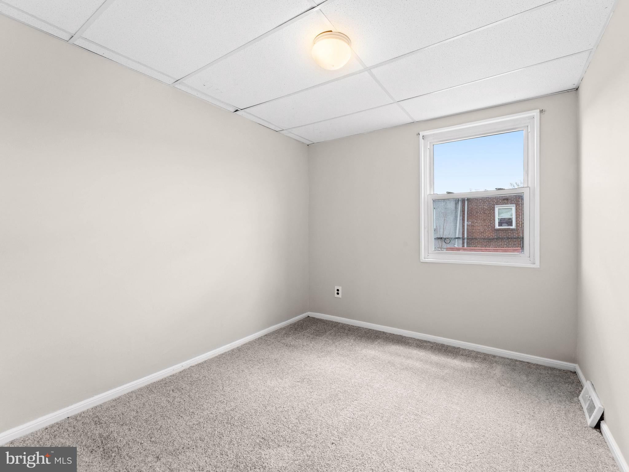 111 Ervin Avenue Marcus Hook, PA 19061 - Photo 17 of 37 an empty room with a window