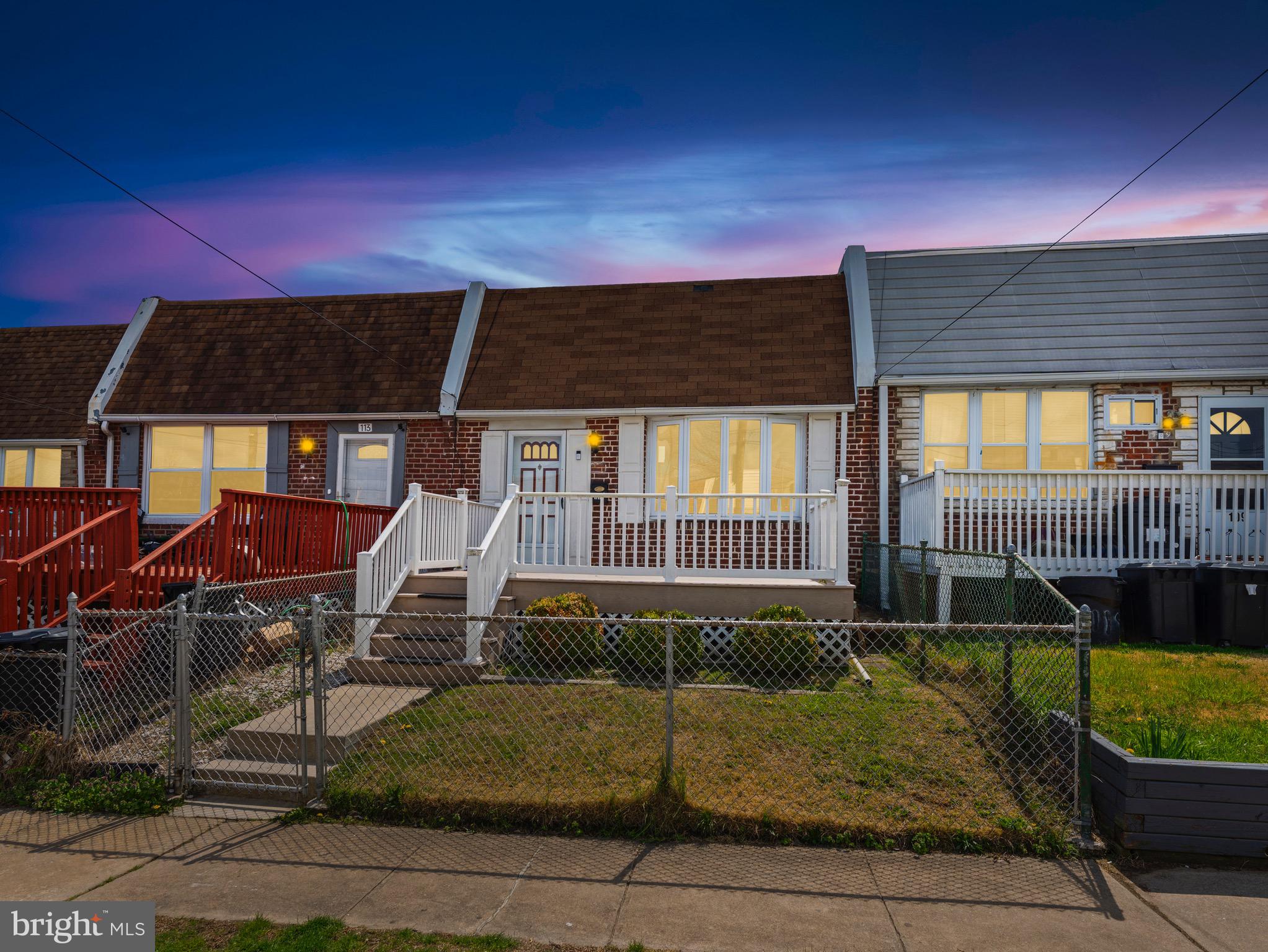 111 Ervin Avenue Marcus Hook, PA 19061 - Photo 4 of 37 a front view of a house with a yard