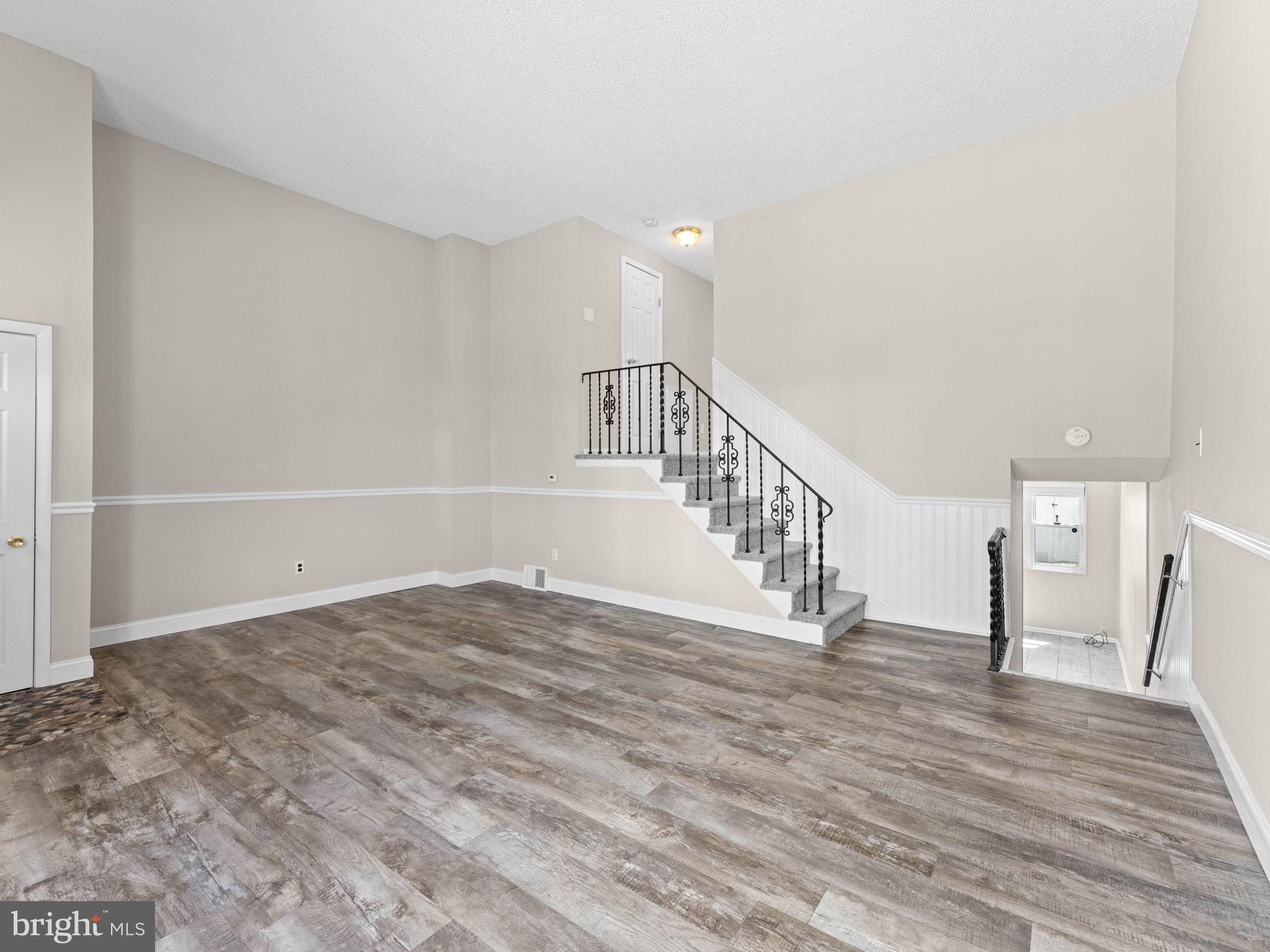 111 Ervin Avenue Marcus Hook, PA 19061 - Photo 6 of 37 a view of entryway with wooden floor