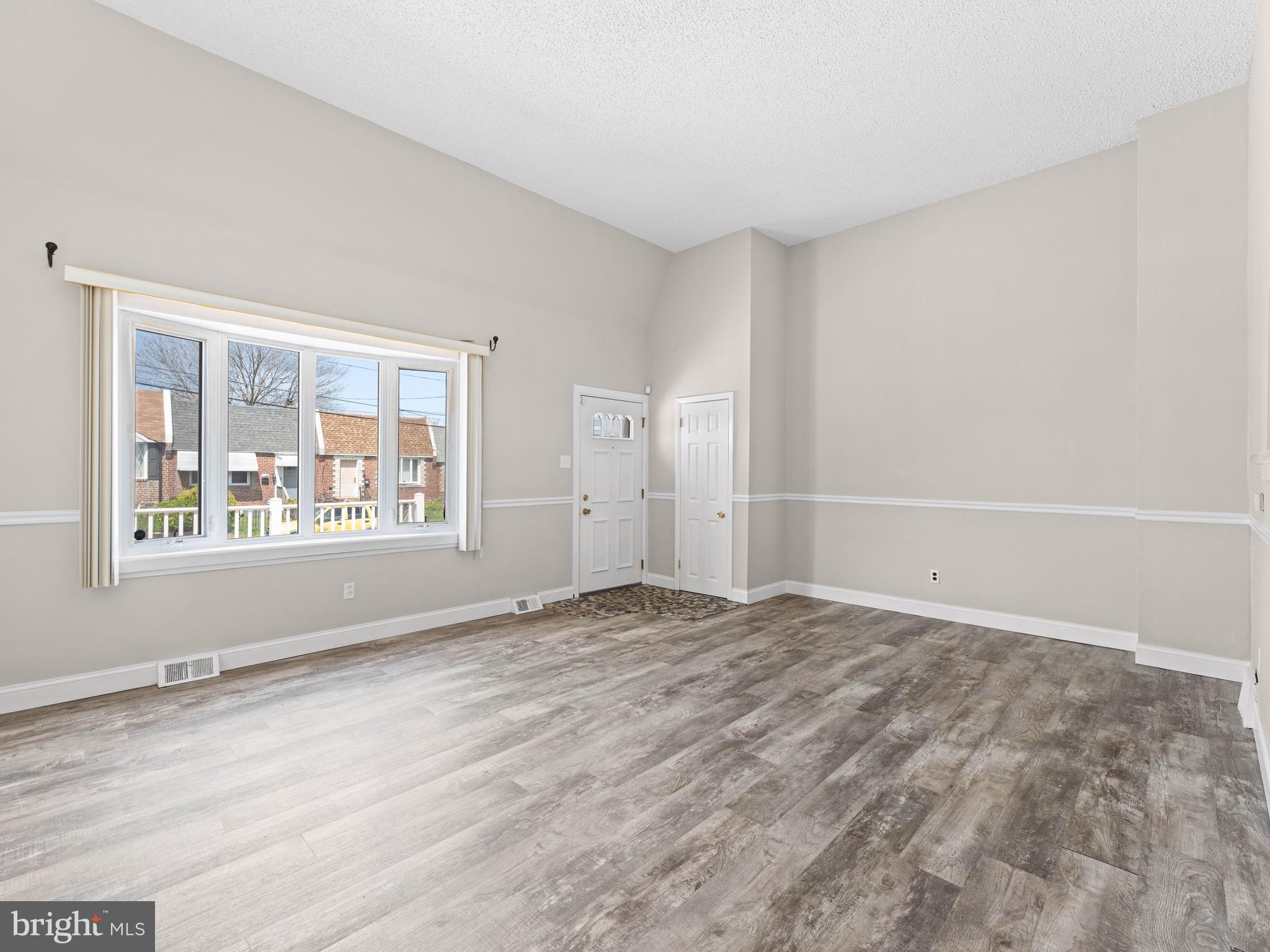111 Ervin Avenue Marcus Hook, PA 19061 - Photo 7 of 37 a view of an empty room with a window