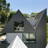 a view of balcony with wooden floor