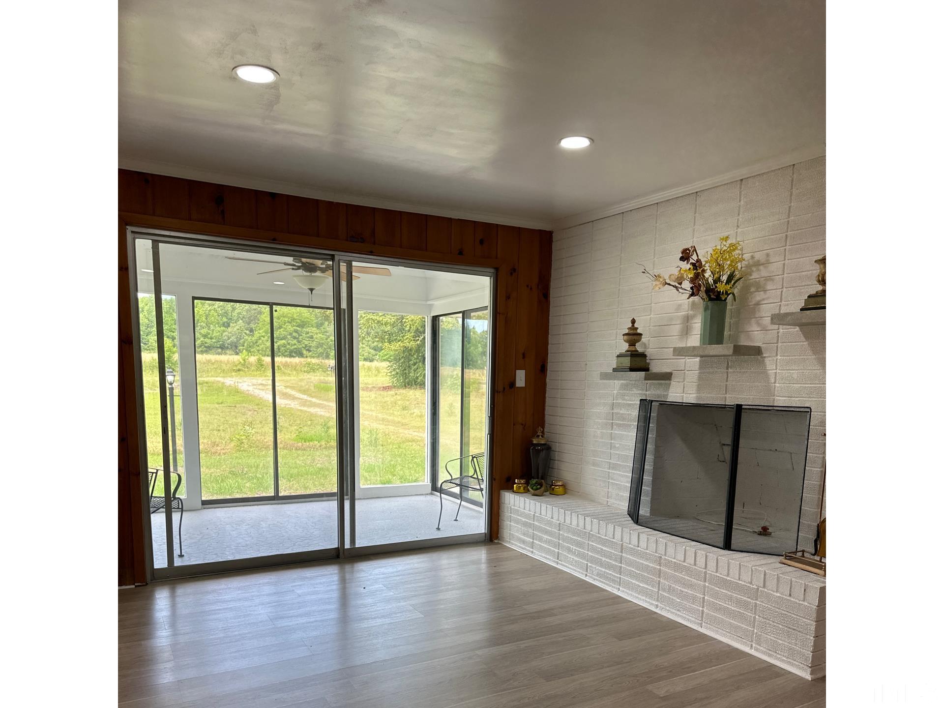 216 Trinity Church Road Louisburg, NC 27549 - Photo 14 of 28 a view of an entryway with wooden floor