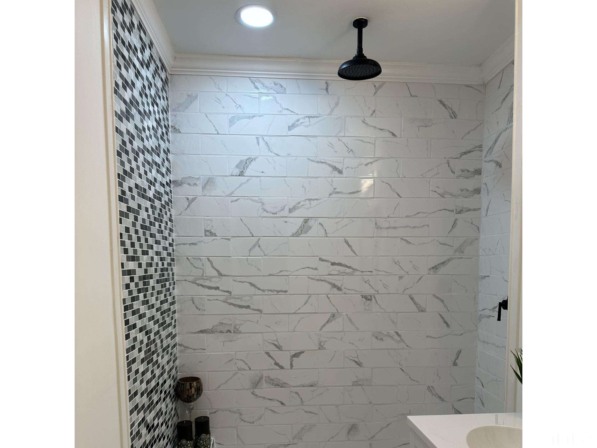 216 Trinity Church Road Louisburg, NC 27549 - Photo 22 of 28 a bathroom with a shower