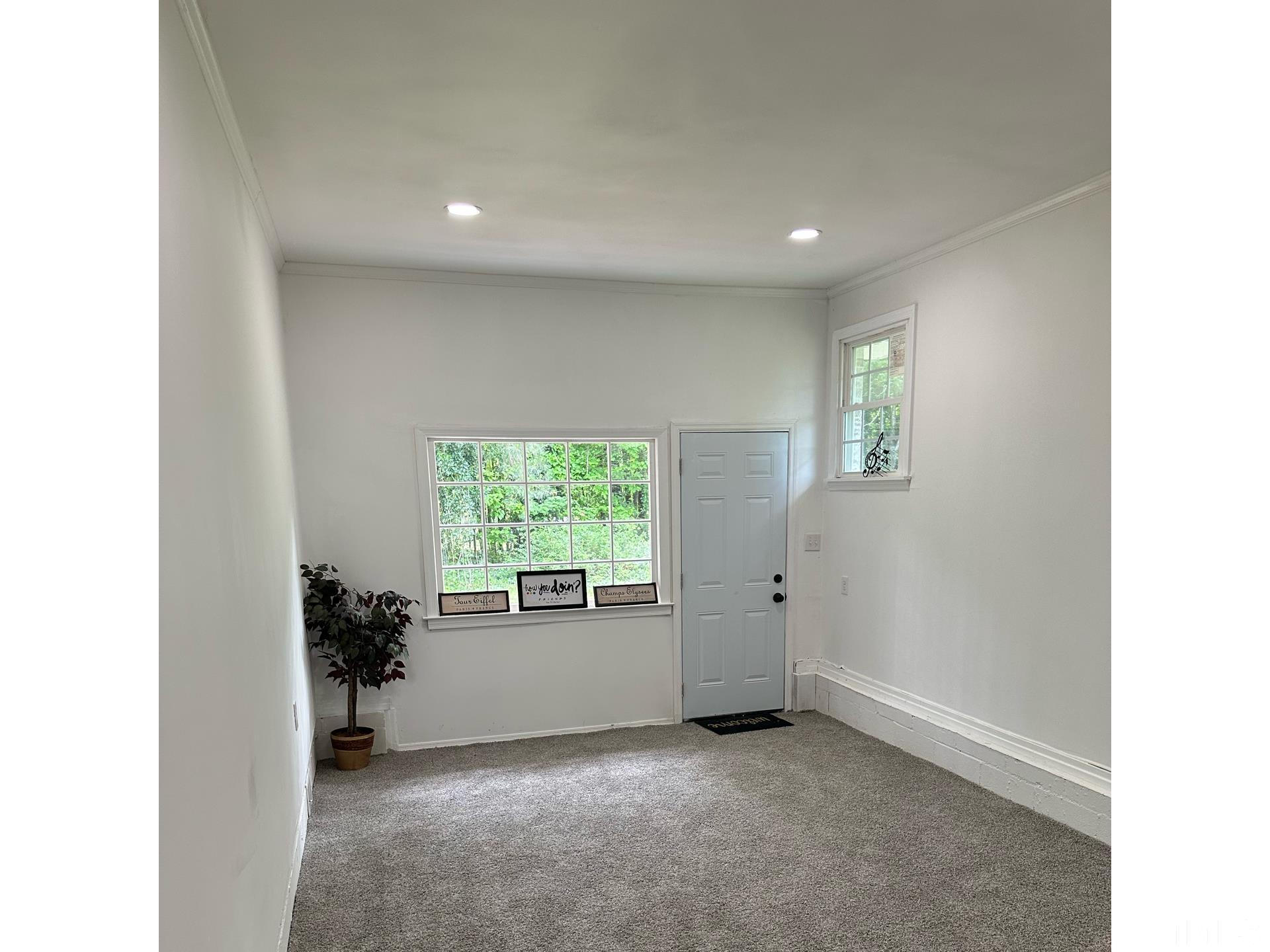 216 Trinity Church Road Louisburg, NC 27549 - Photo 27 of 28 a view of an empty room with a window