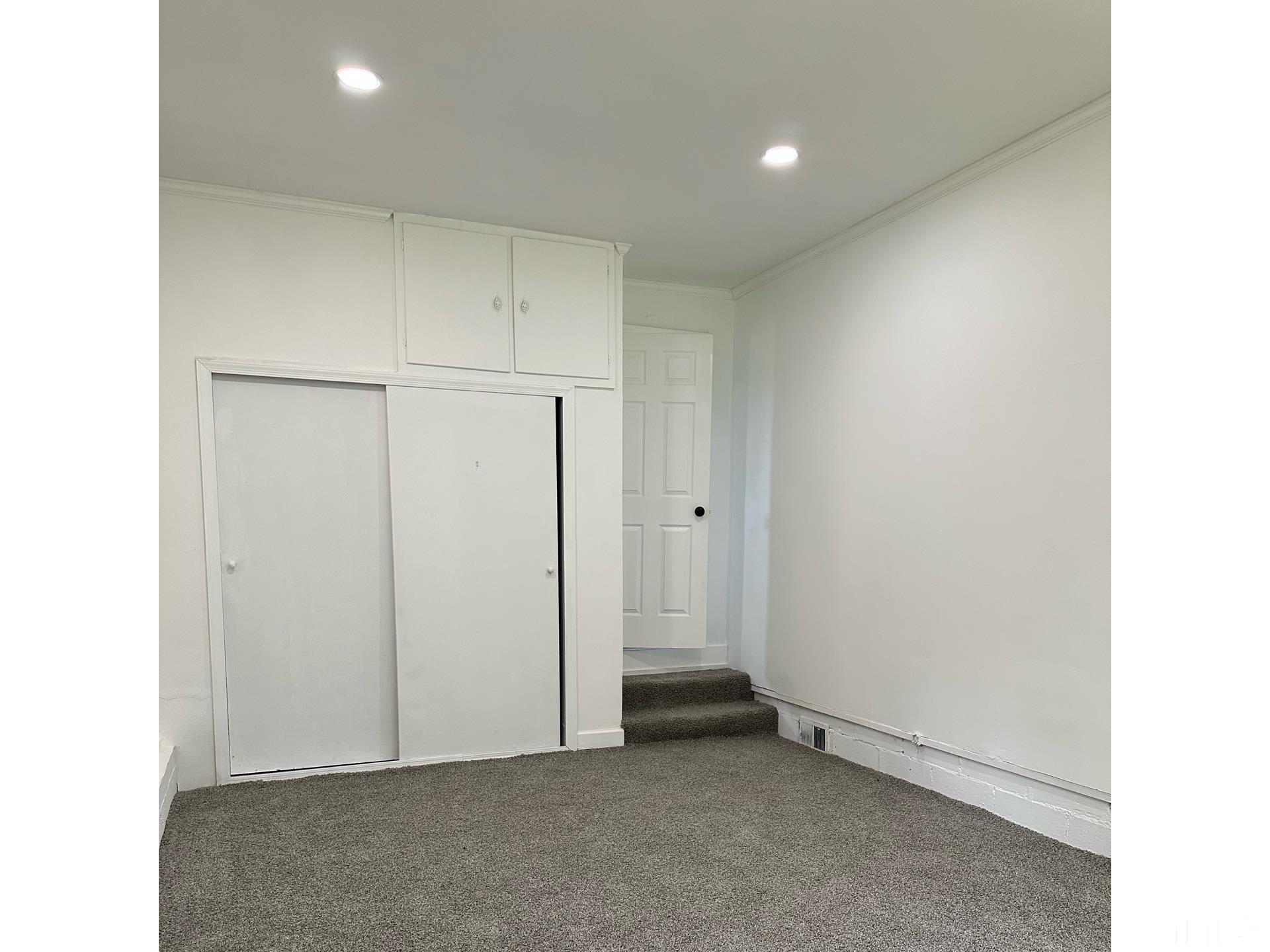 216 Trinity Church Road Louisburg, NC 27549 - Photo 28 of 28 a view of an empty room