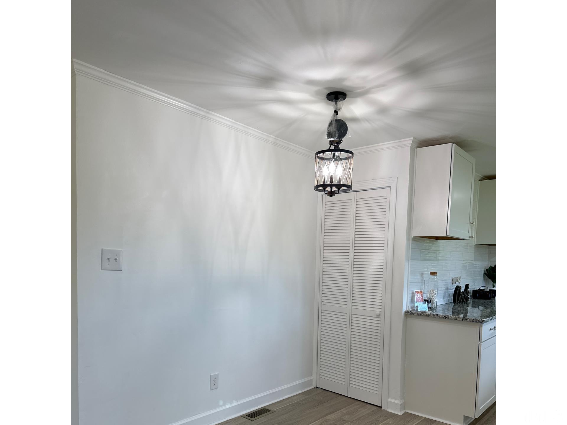 216 Trinity Church Road Louisburg, NC 27549 - Photo 6 of 28 a very nice looking room with a ceiling fan